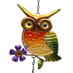 Hanging owl wind chime on patio