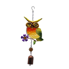 Whimsical owl wind chime close-up