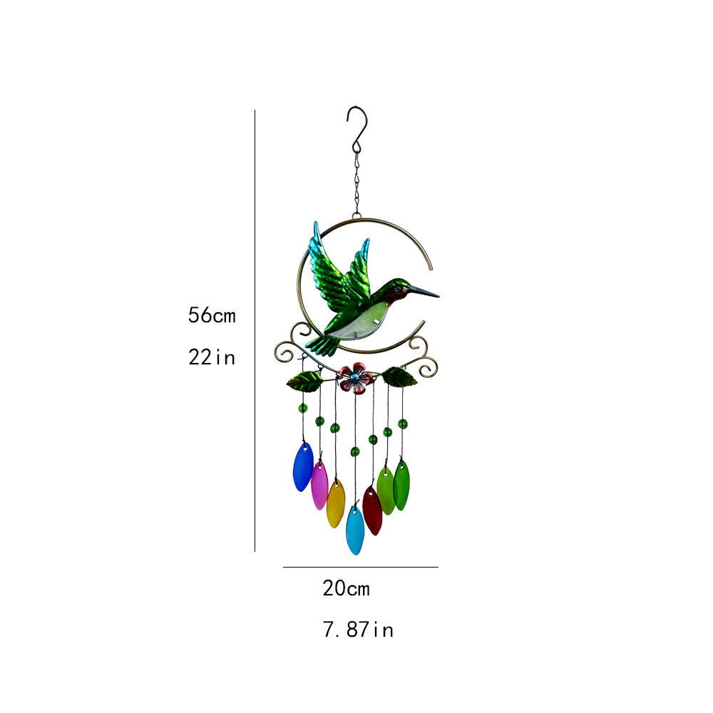 Close-up of colorful glass accents on wind chime
