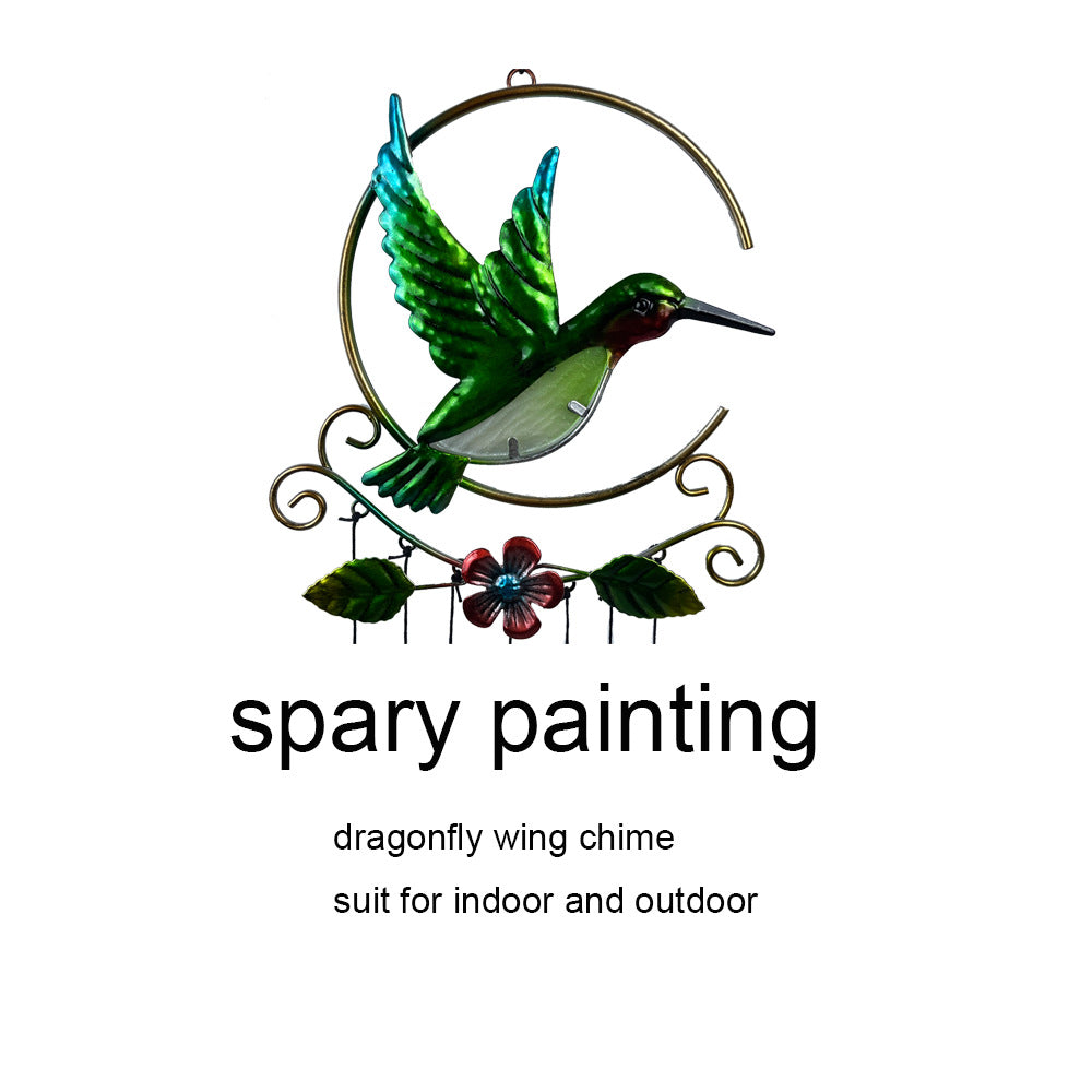 Vibrant metal wind chime hanging in sunlight