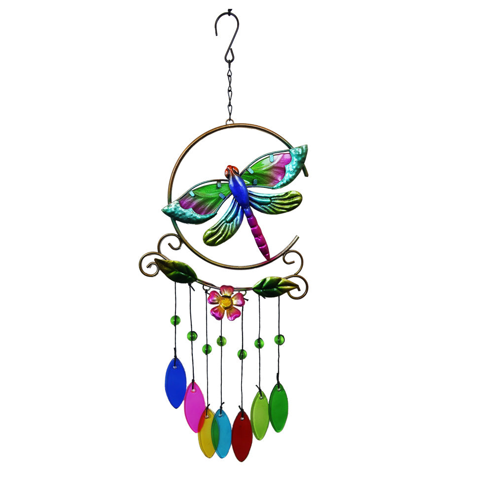 Stunning metal art wind chime in a garden