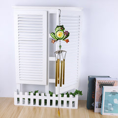 Wind chime featuring frog motifs and glass decor