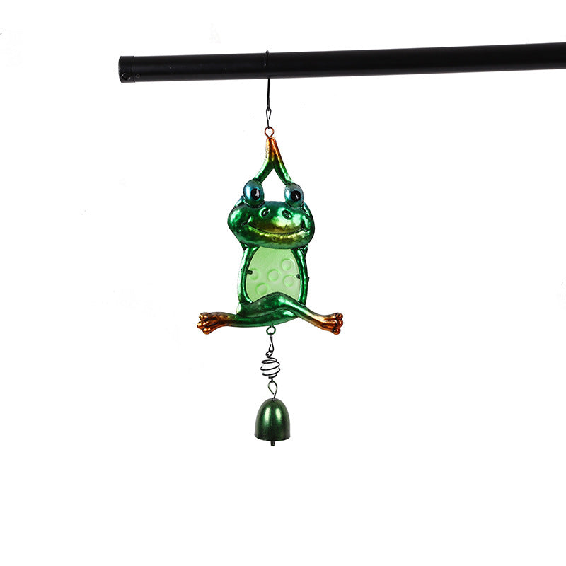 Enchanting Metal Frog Wind Chime in garden setting