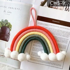 Cheerful nursery wall decor featuring rainbows