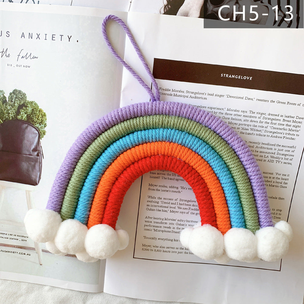 Creative kids room decor with clouds and rainbows
