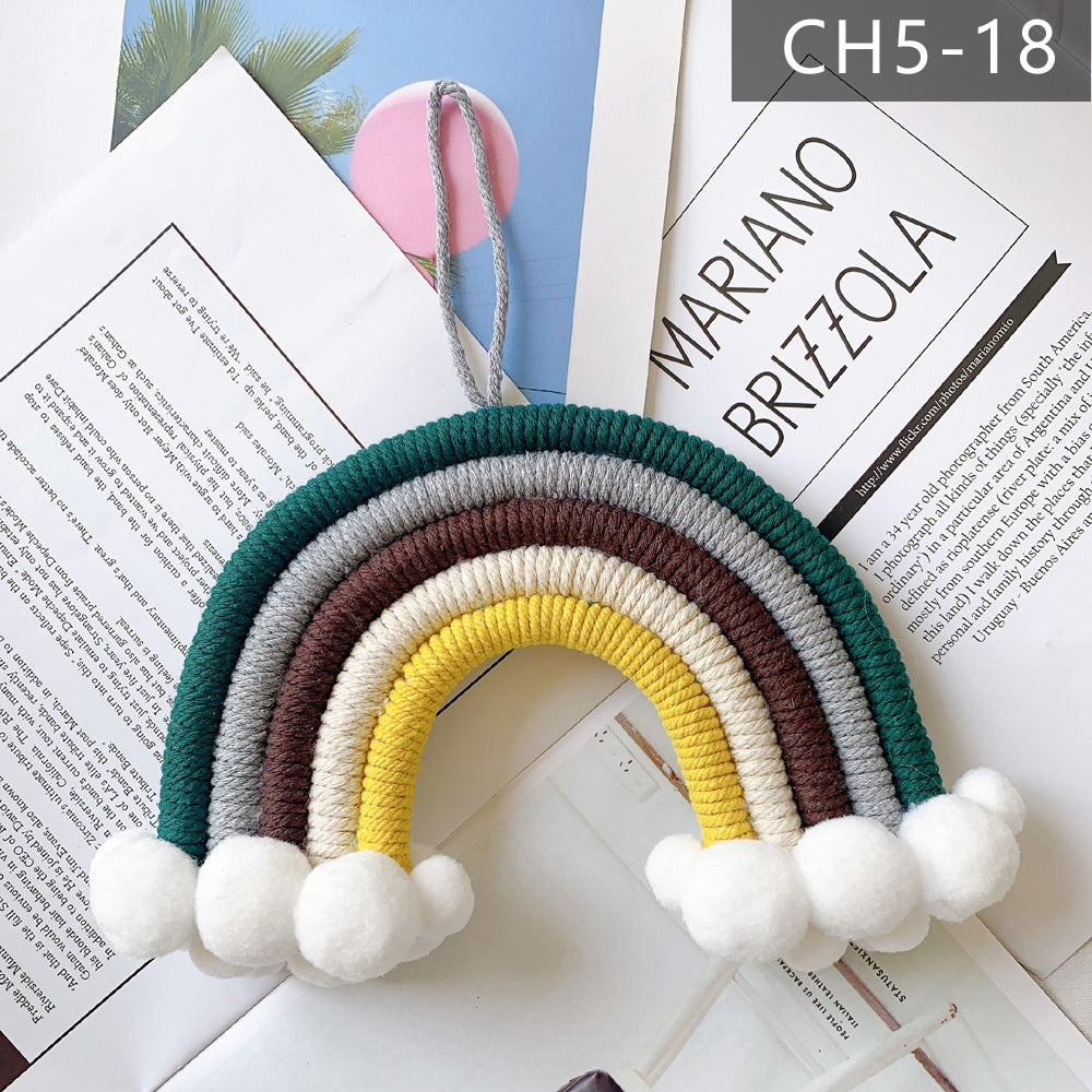 Cheerful nursery wall decor featuring rainbows
