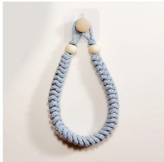 Handwoven rope toilet paper holder front view