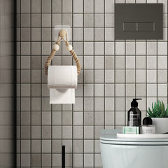 Handwoven toilet paper holder installation demonstration