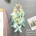Handmade Dream Catcher Wind Chime in a bright room