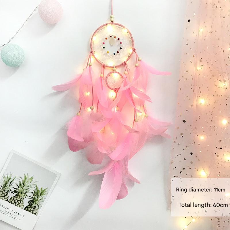 Decorative wind chime with natural fibres