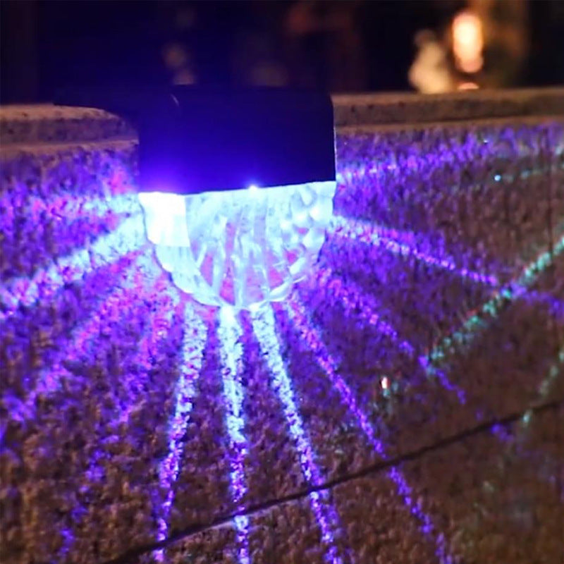 Close-up of solar LED garden light showing acrylic design