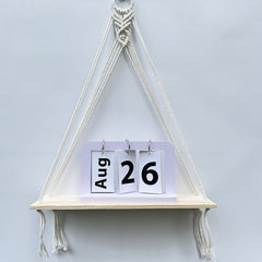 Versatile hanging shelf in natural tones image 4