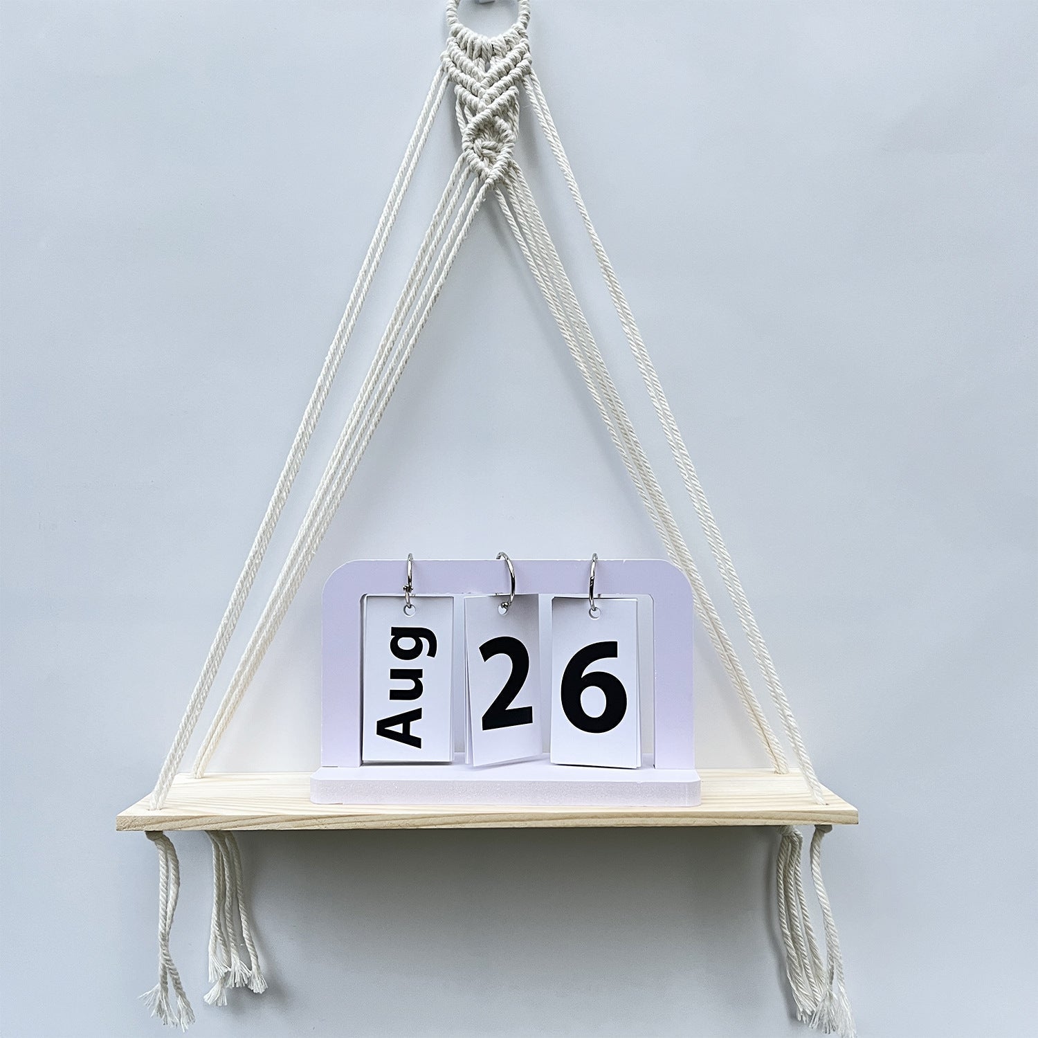 Versatile hanging shelf in natural tones image 4