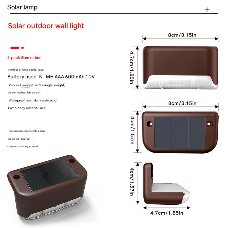 Outdoor solar powered railing light on a garden railing
