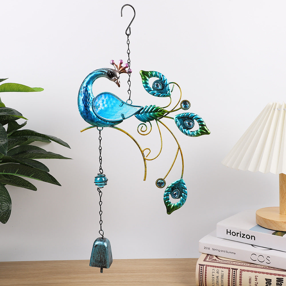 Metal wind chime hanging in a garden