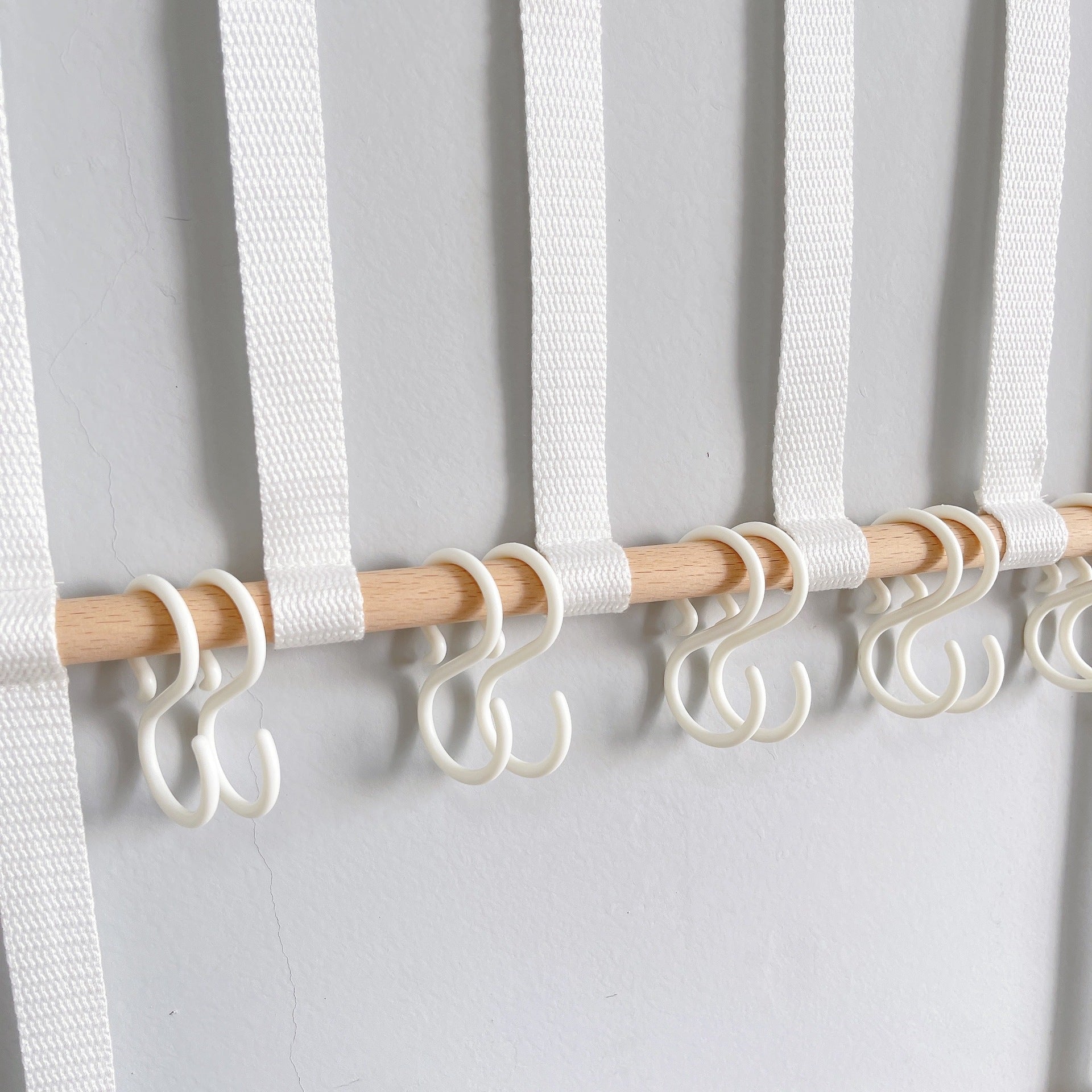 Adhesive hook for easy hair accessory storage