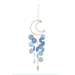 Wind chime catching breeze on balcony image 5