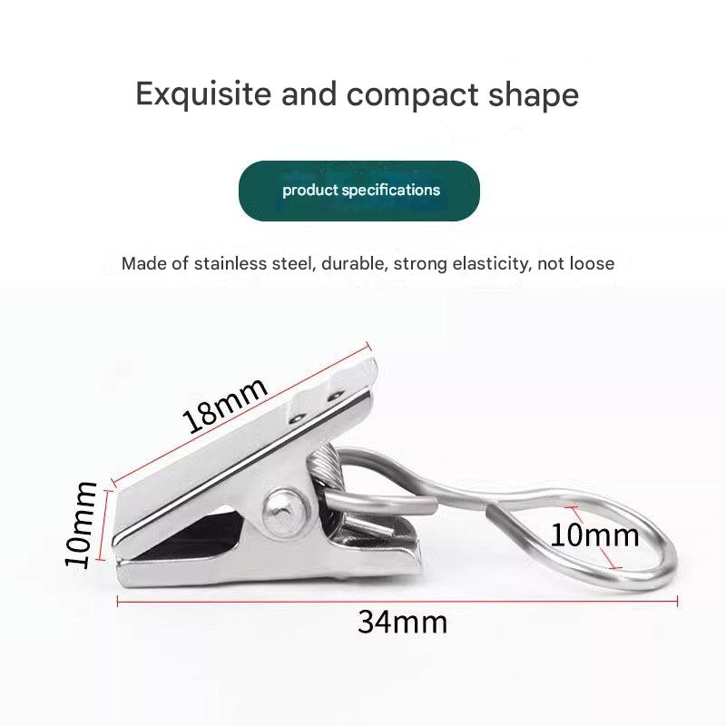 sturdy stainless steel clips securing curtains
