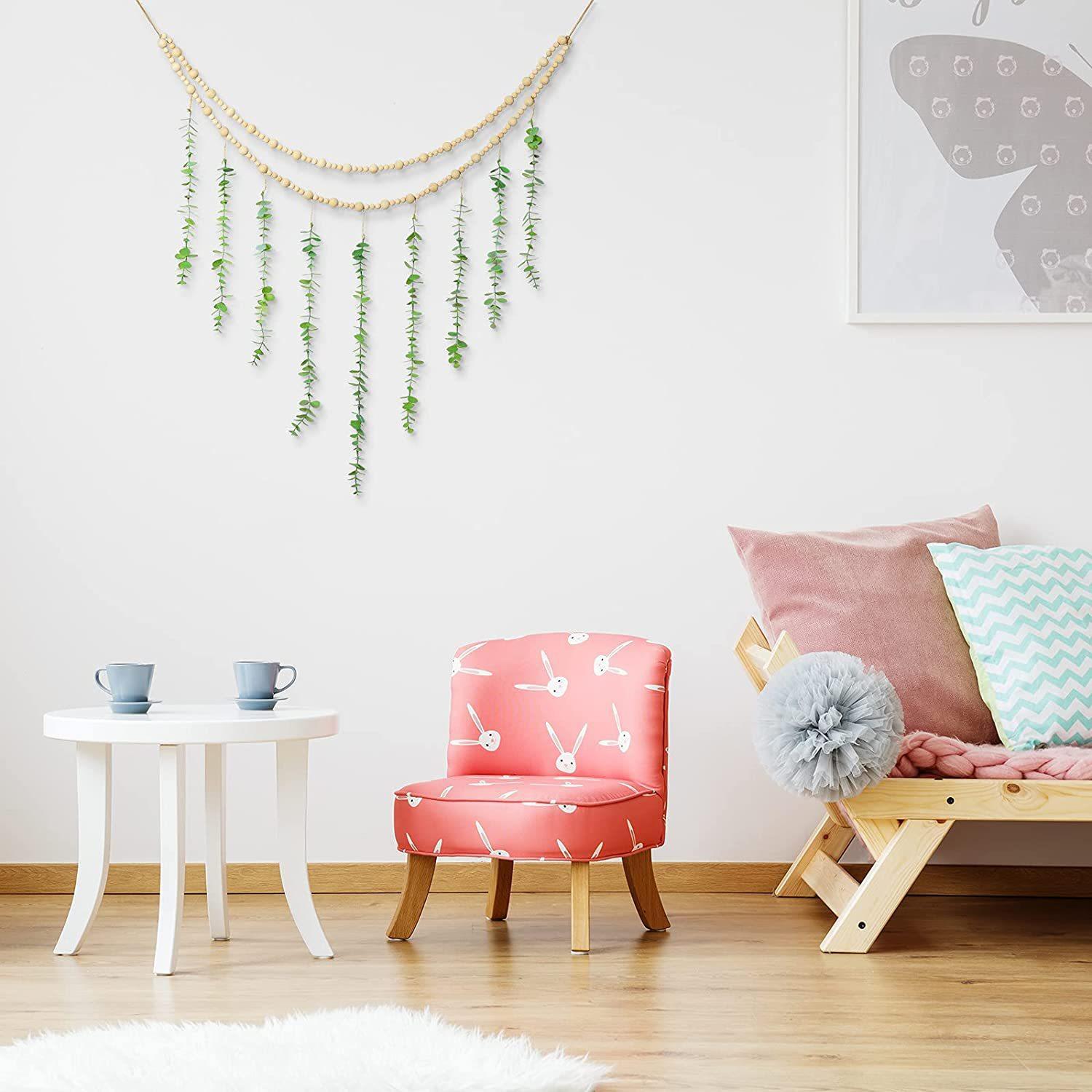 faux plant wall art displayed on wall
