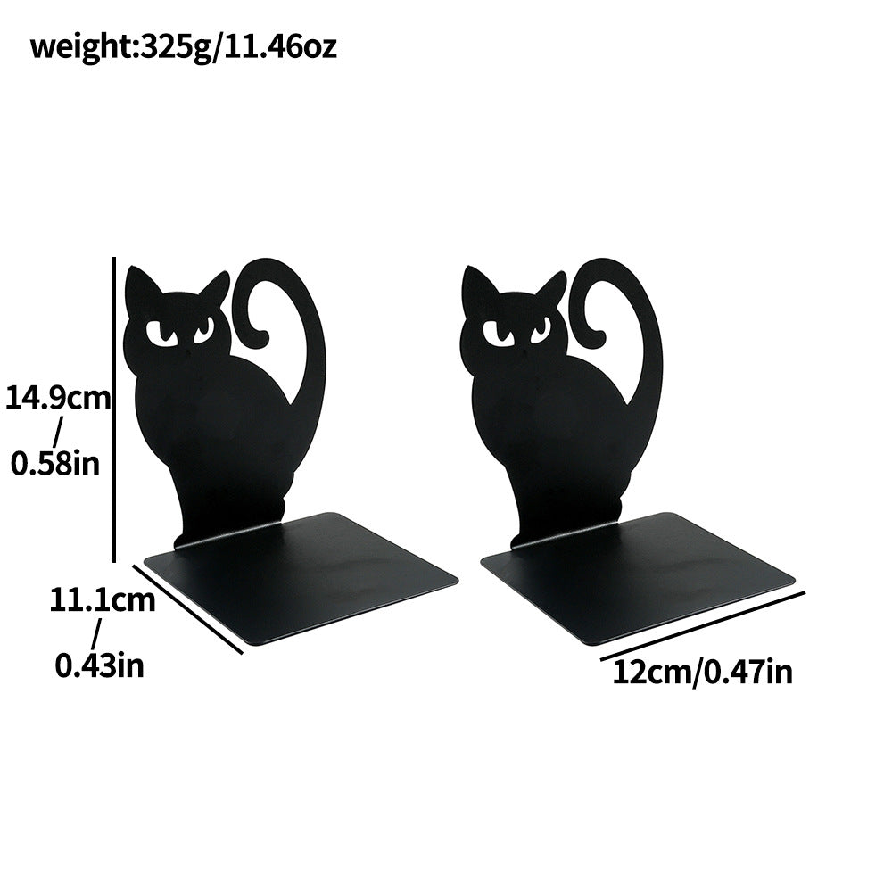 Decorative cat bookends used in bookshelf