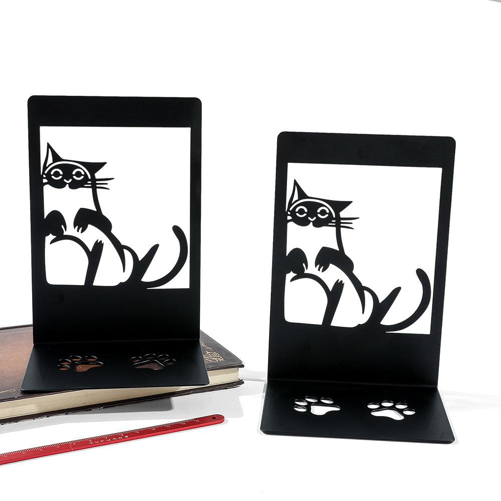 Functional cat bookends holding books upright