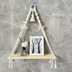Close-up of natural cotton rope wall shelf