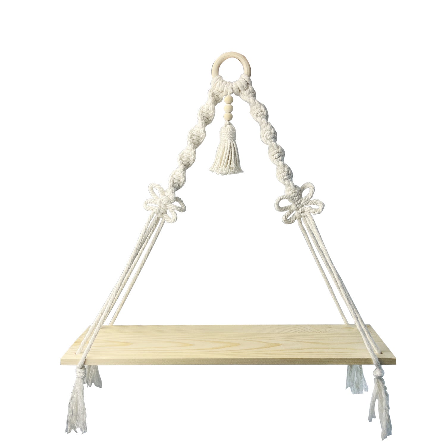 Decorative macrame shelf holding plants indoors