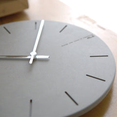 Back view of silent wall clock with hook