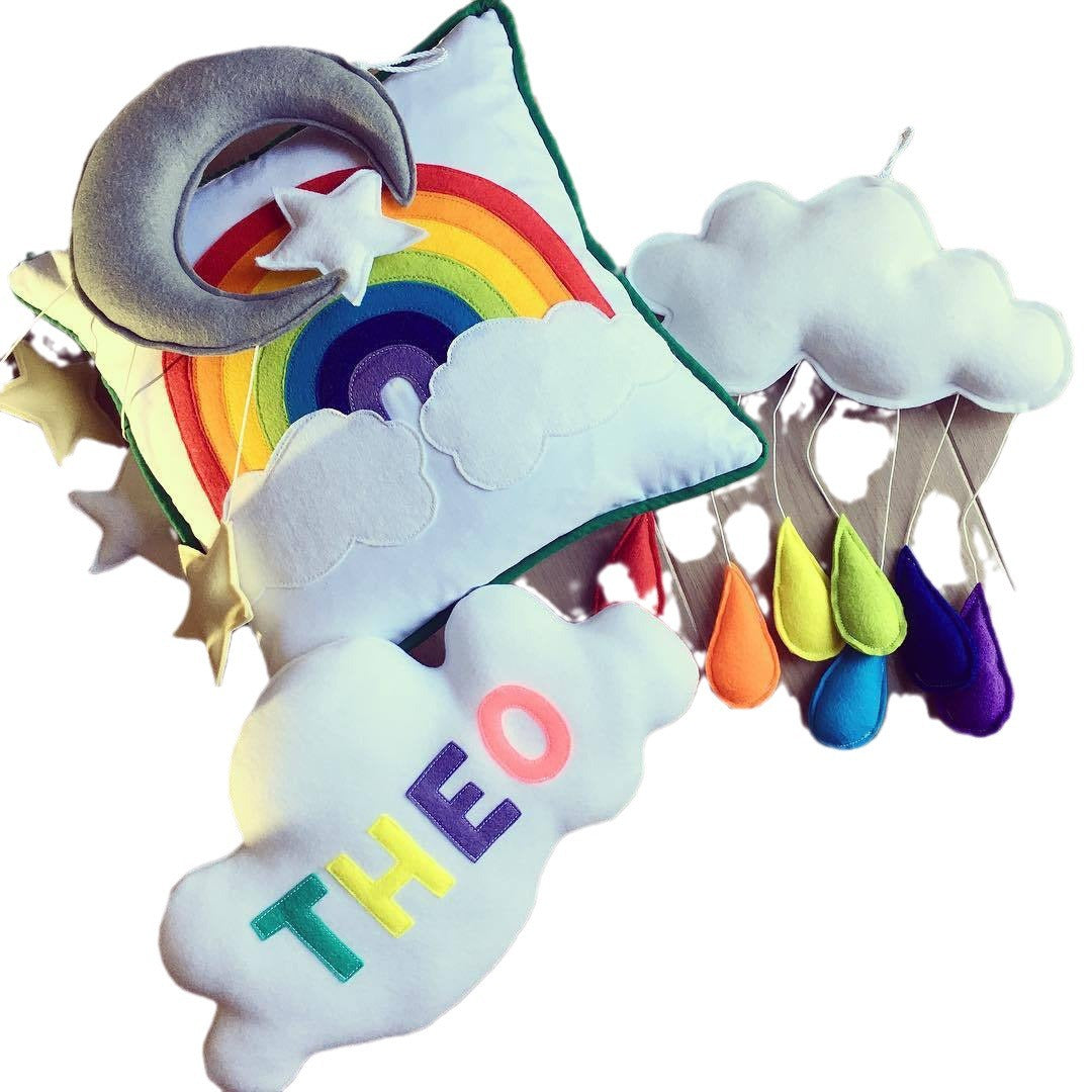 decorative rainbow felt elements in children's space