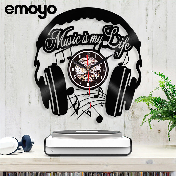 Close-up of vinyl wall clock showcasing music design