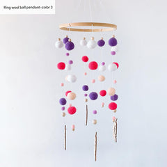 Whimsical wall art featuring wind chimes