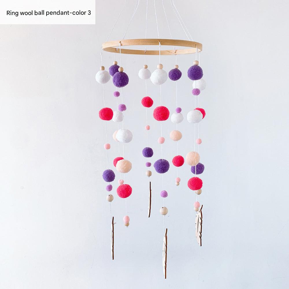 Whimsical wall art featuring wind chimes