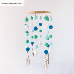 Nordic style hanging decor with pom poms