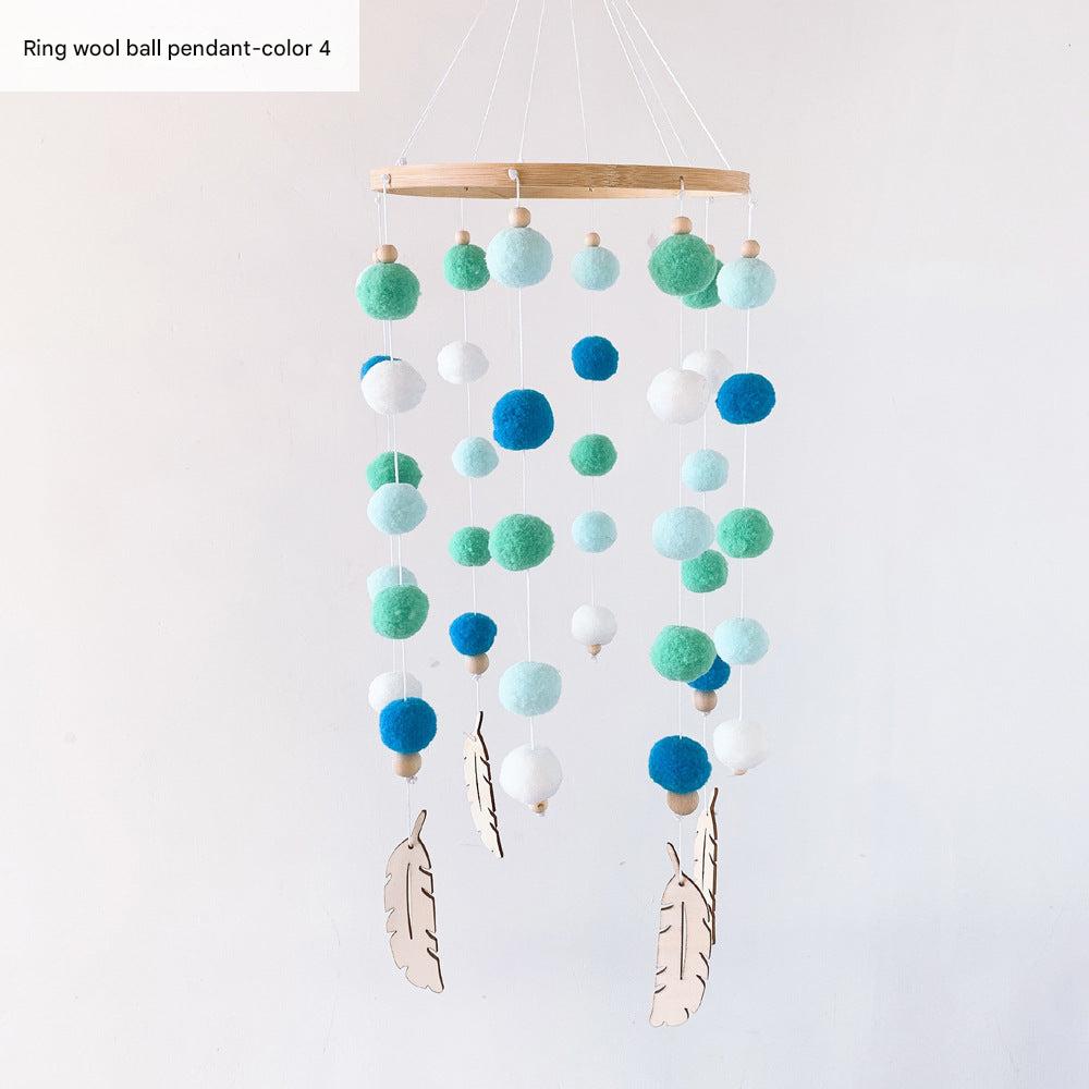 Nordic style hanging decor with pom poms