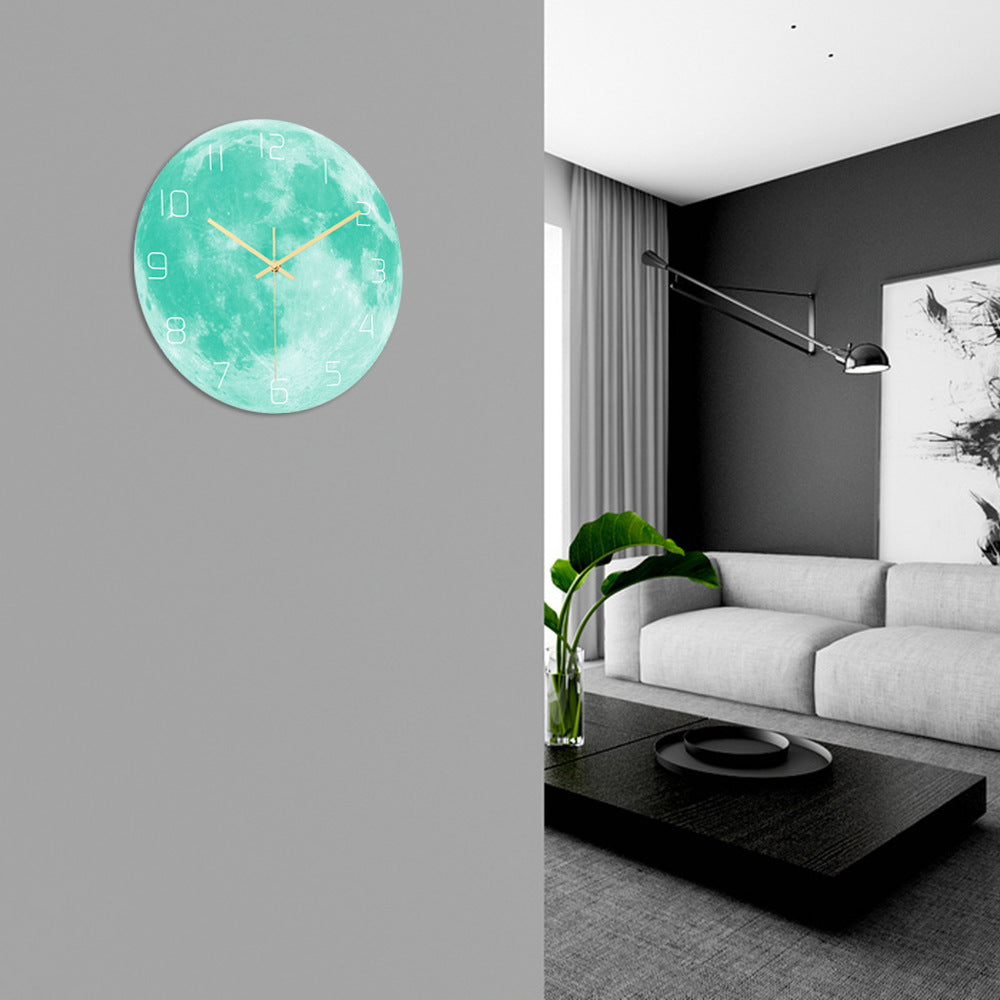 installation of moon wall clock in home setting