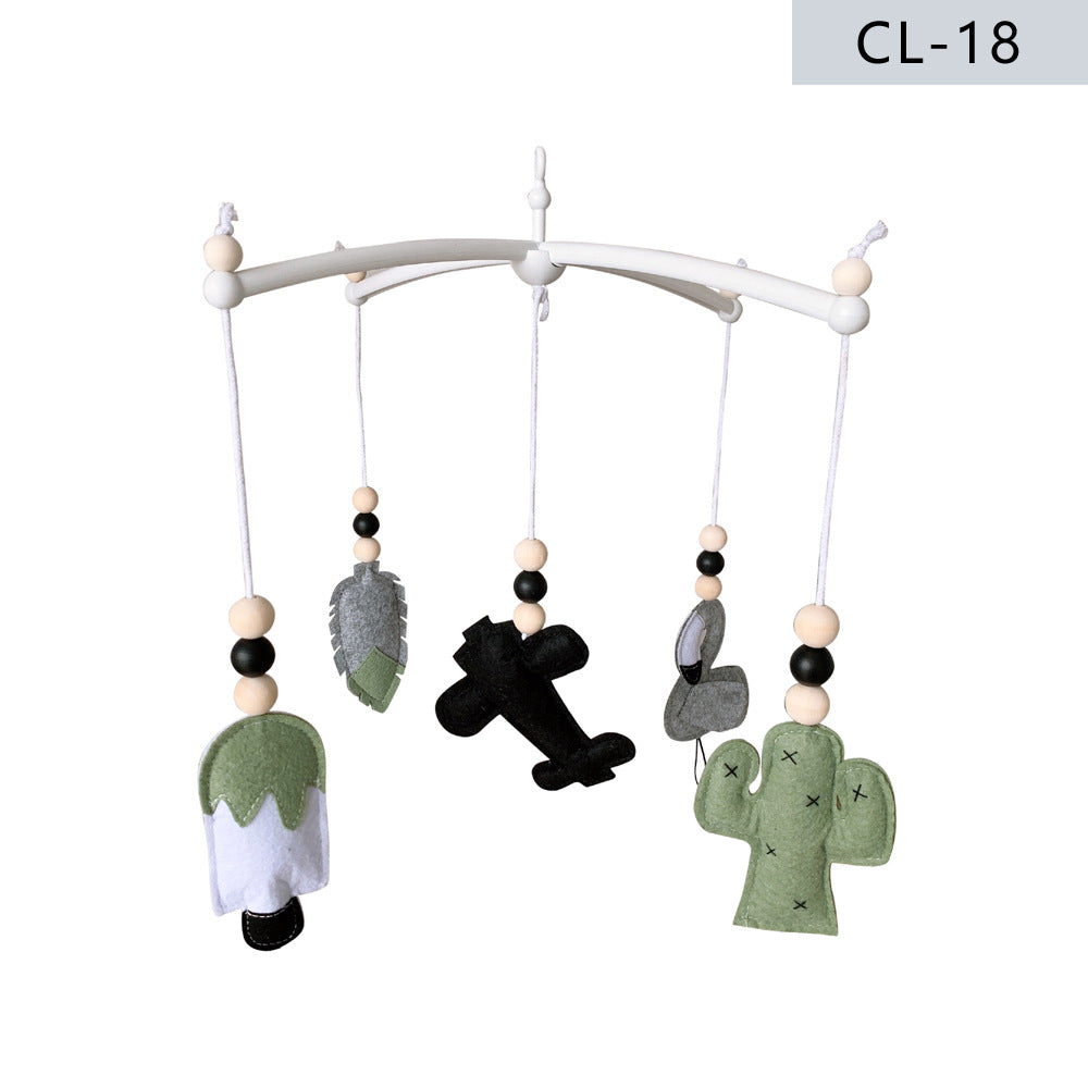 interactive felt baby mobile hanging in nursery