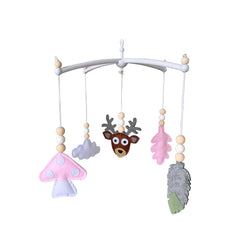 interactive felt baby mobile hanging in nursery