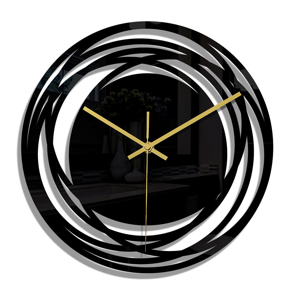 Clock featuring a stylish round black face