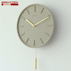 Elegant wall clock mounted on a minimalistic wall