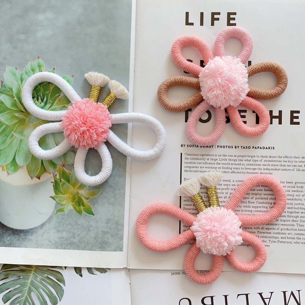 Close-up of vibrant macramé wall decoration for kids
