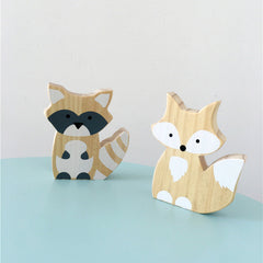 Wooden fox in children's room on a shelf