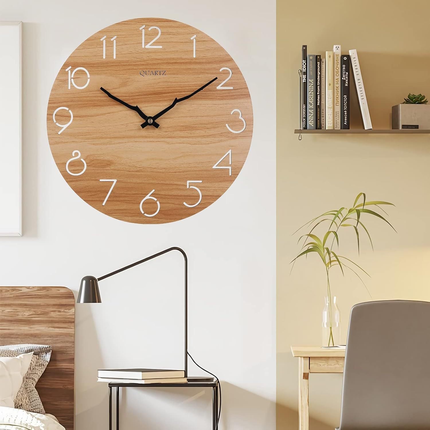 Close-up of the openwork design on the walnut wall clock
