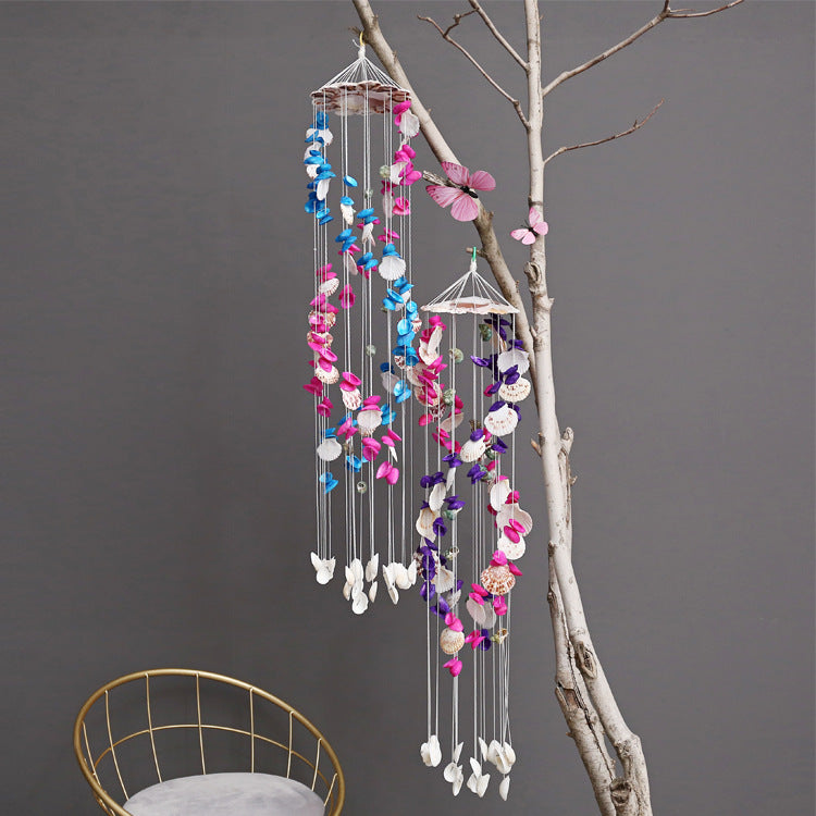 Elegant decorative wind chime in sunny garden