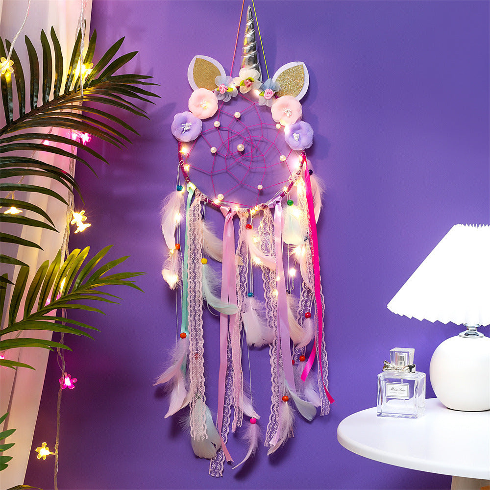 Colourful unicorn dreamcatcher with Indian feathers