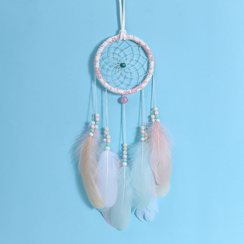 Fairy light dreamcatcher displayed indoors