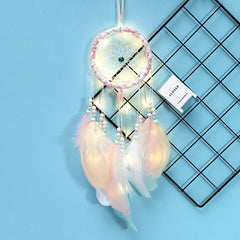 Heart-shaped dreamcatcher with fairy lights in white