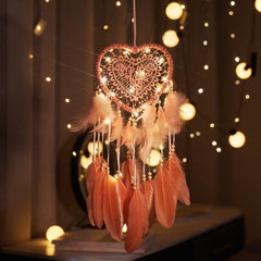 Dreamcatcher with multicolour lights hanging on wall