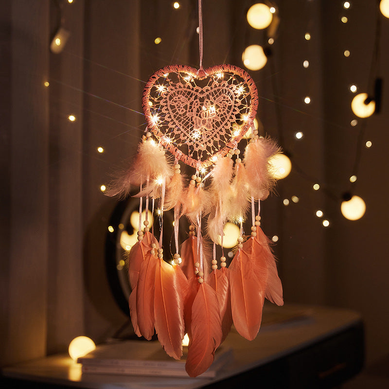 Dreamcatcher with multicolour lights hanging on wall