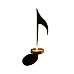 Candle holder mounted on a wall with candles