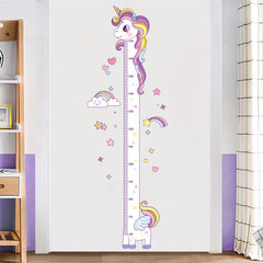 Kids measuring their height with unicorn chart